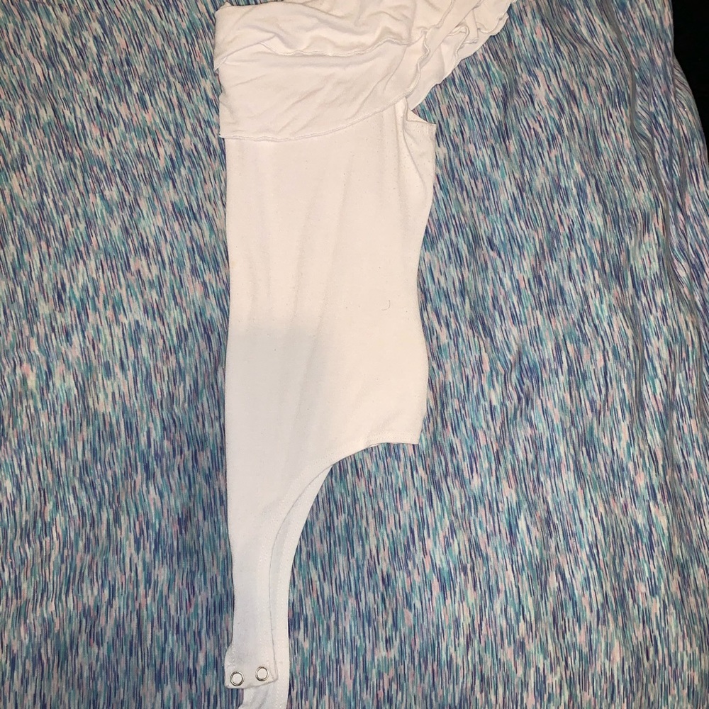 white off the shoulders top .
